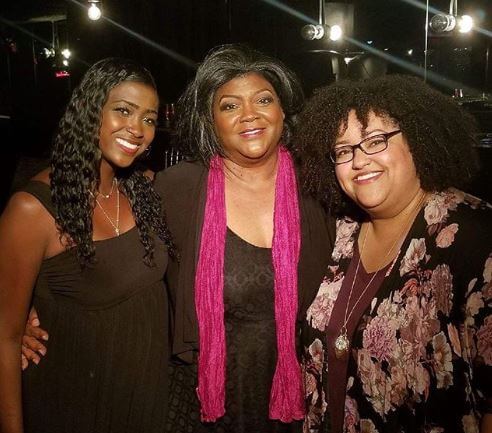 Desiree Gabrielle Dennis-Dylan with her mother and sister Crystal.